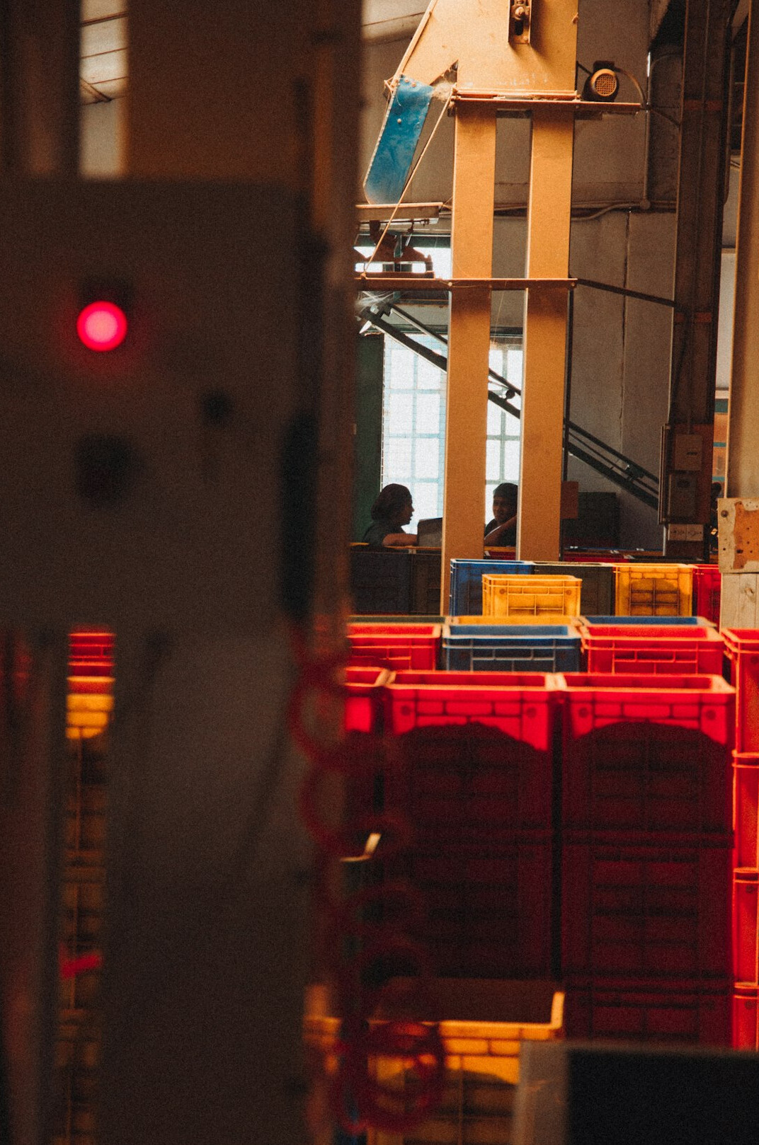 Warehouse worker scanning packages with a handheld device