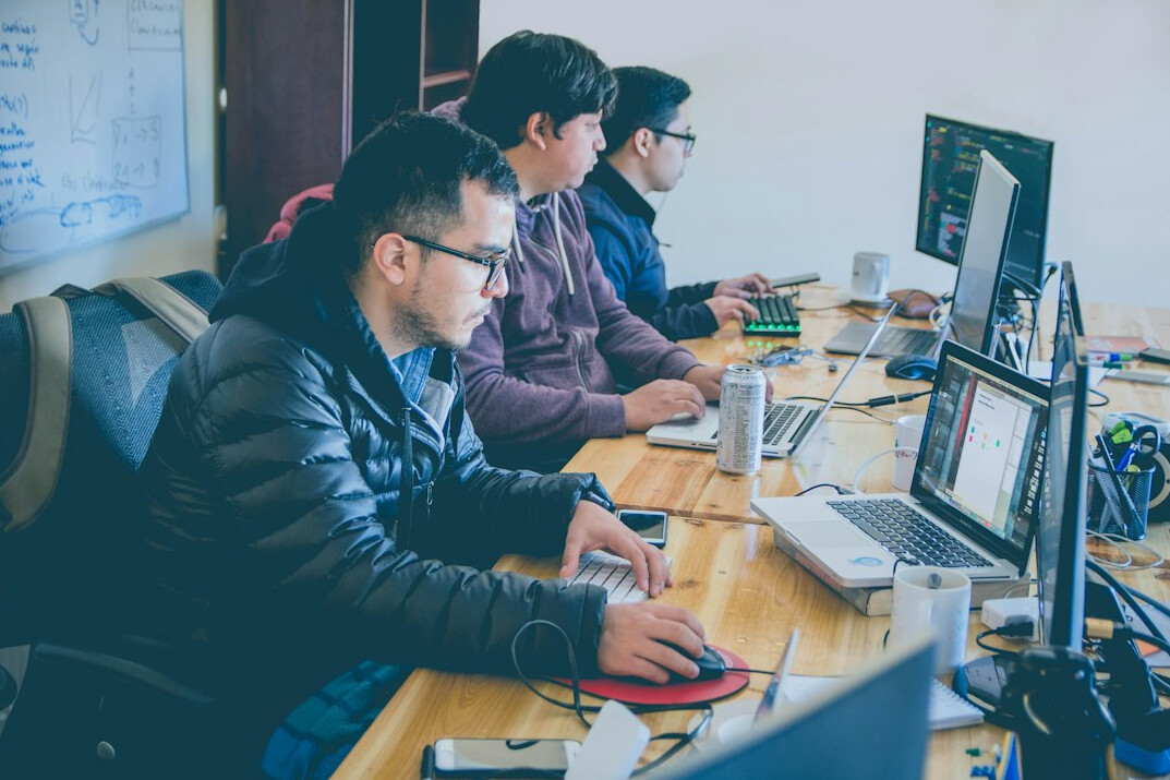 team of programmers collaborating